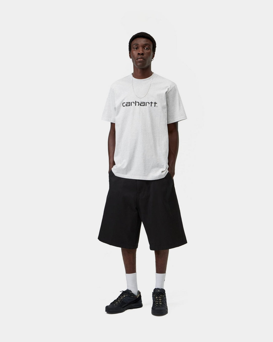 Carhartt WIP S/S Script T-Shirt in Ash Heather / Graphite, shown front view on a model with Script logo on the chest.