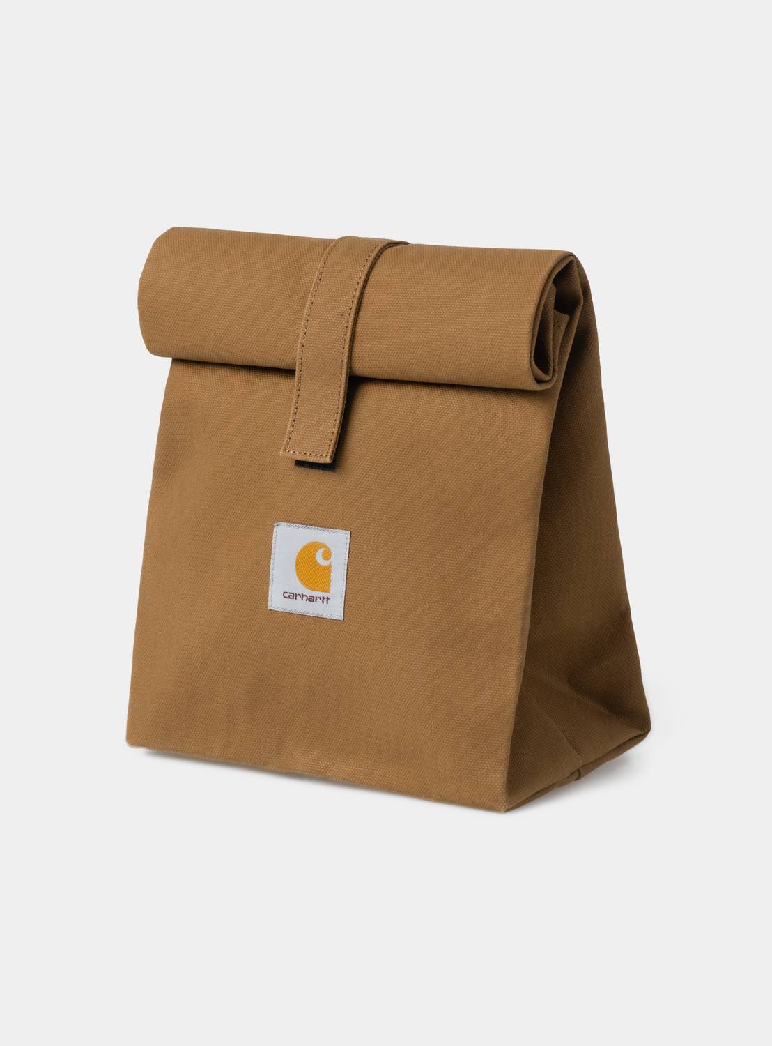 Carhartt WIP Lunch Bag in Hamilton Brown canvas with roll-top closure and front Square Label.