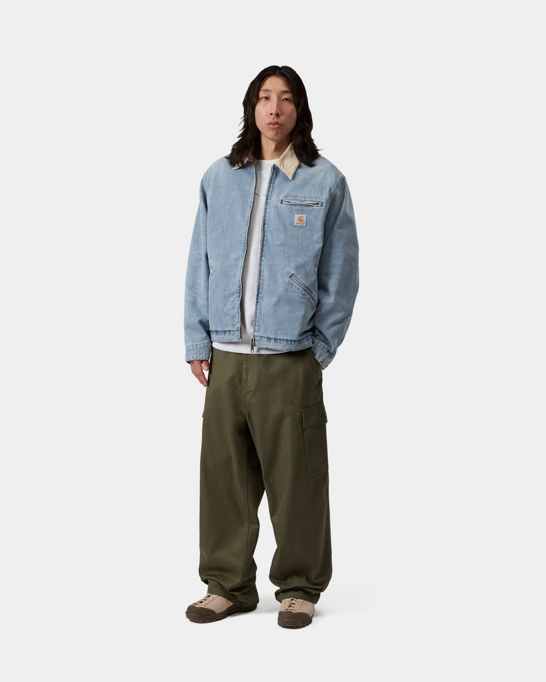 Carhartt WIP OG Detroit Jacket in Blue / Dusty H Brown, front view worn by model.
