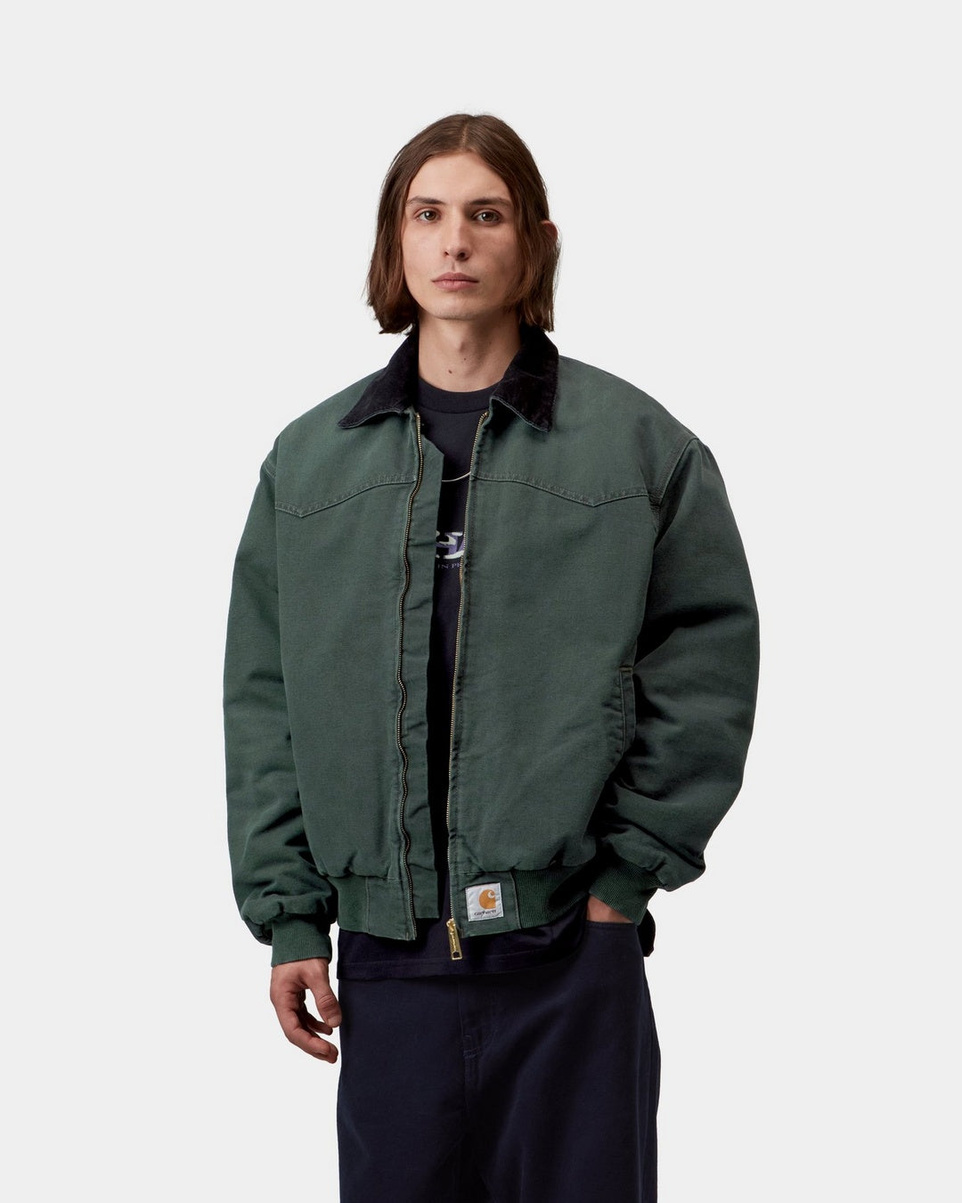Carhartt WIP OG Santa Fe Jacket in Raven / Black, front view, worn open with corduroy collar and square label visible.