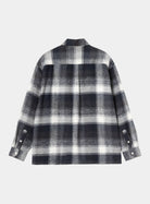 Carhartt WIP L/S Esterson Shirt in Esterson Check Dark Navy, back view, showing the allover check pattern and buttoned cuffs.