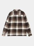 Carhartt WIP L/S Esterson Shirt in Esterson Check, Tobacco, shown from the back with an allover check pattern and buttoned cuffs.