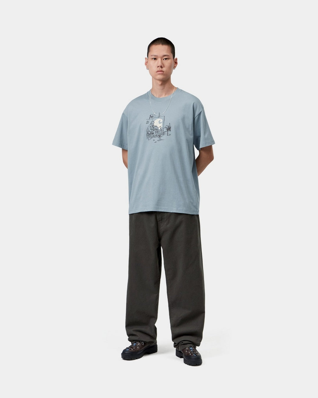 Carhartt WIP S/S Old Painter T-Shirt in Citadel, front view, with graphic print on the chest, shown on model.
