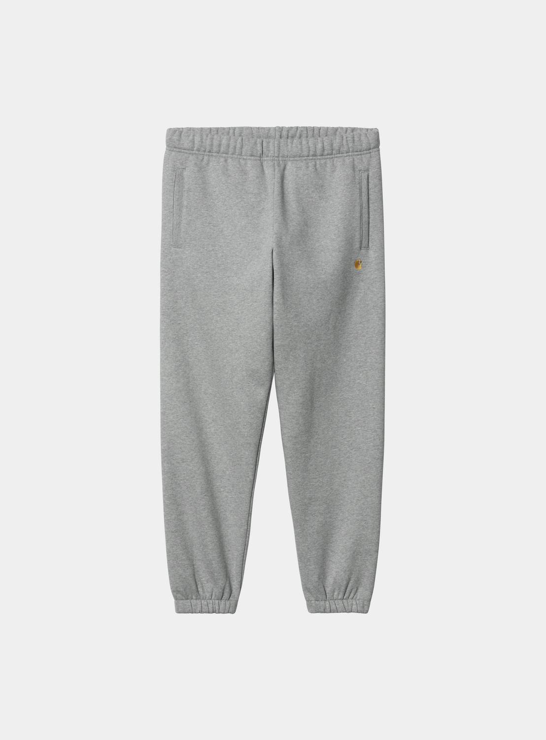 Carhartt WIP Chase Sweat Pant in Grey Heather / Gold, front view, with elastic waistband, zip pockets and embroidered logo detail on the leg.