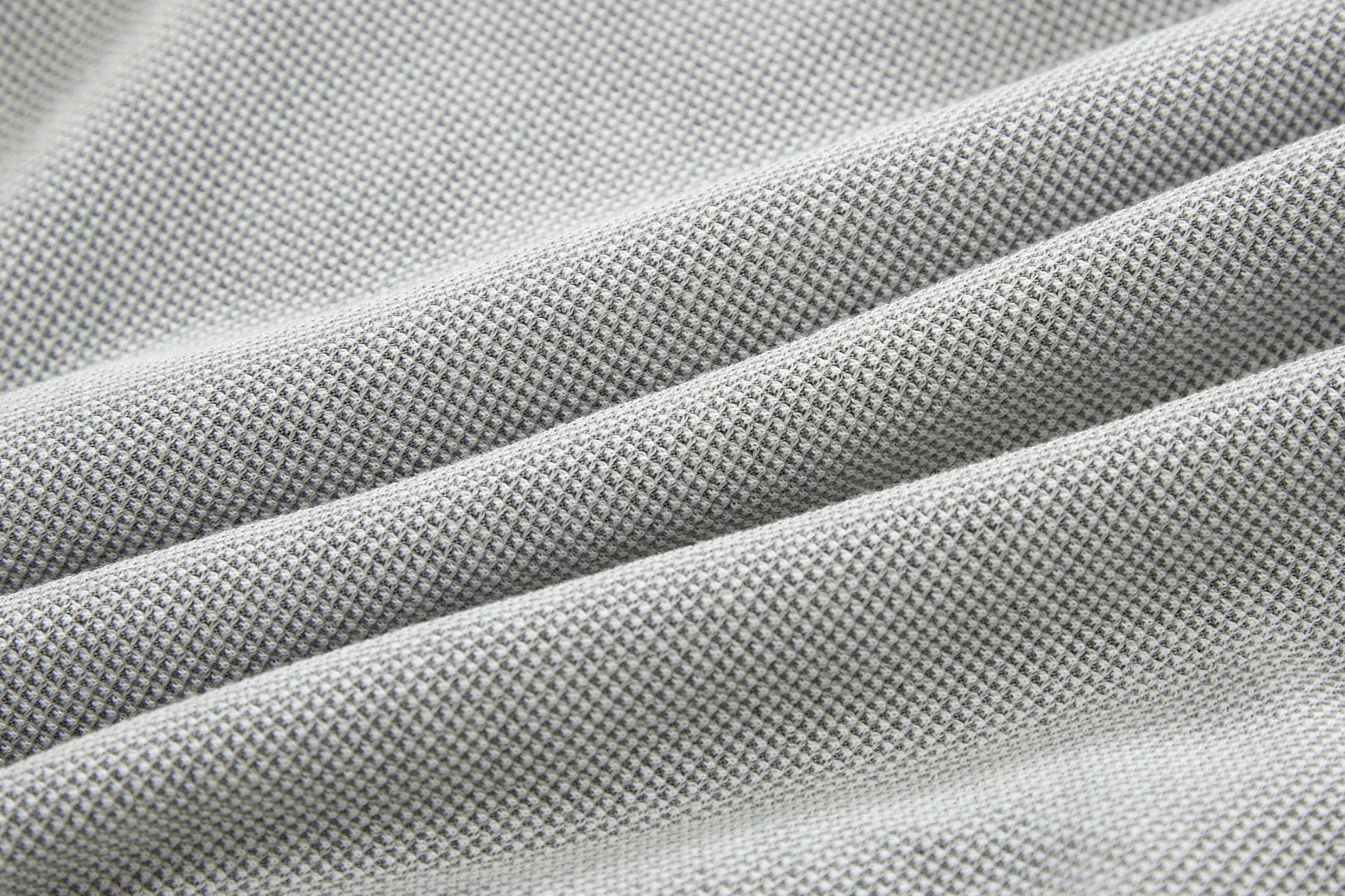 Close-up of gray fabric with a textured pattern