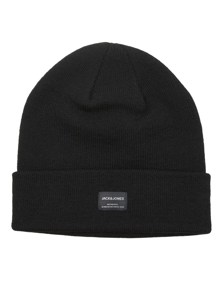 Black beanie with a brand label on a white background