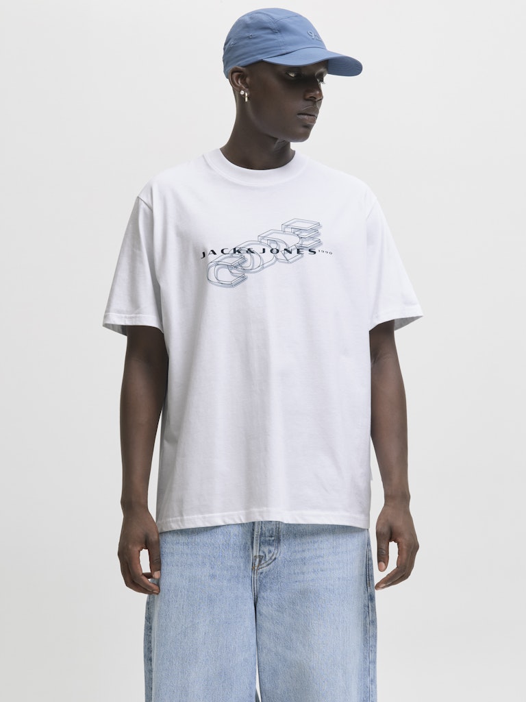 Person wearing a white 'Jack & Jones' t-shirt and light blue cap on a plain background