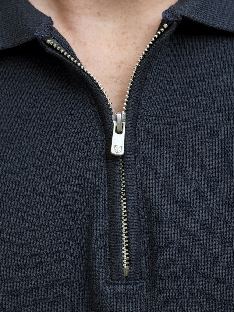 Navy polo zip detail
