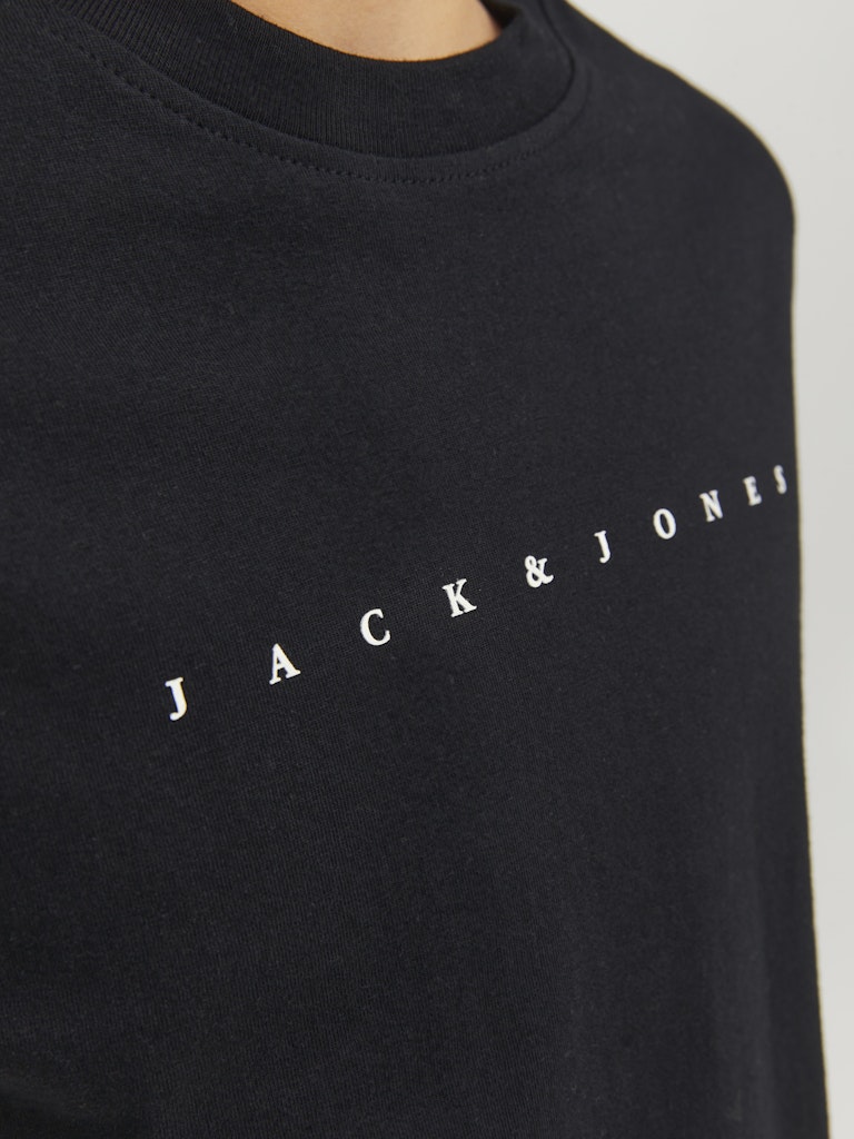 Black sweatshirt with 'Jack & Jones' logo on a light gray background
