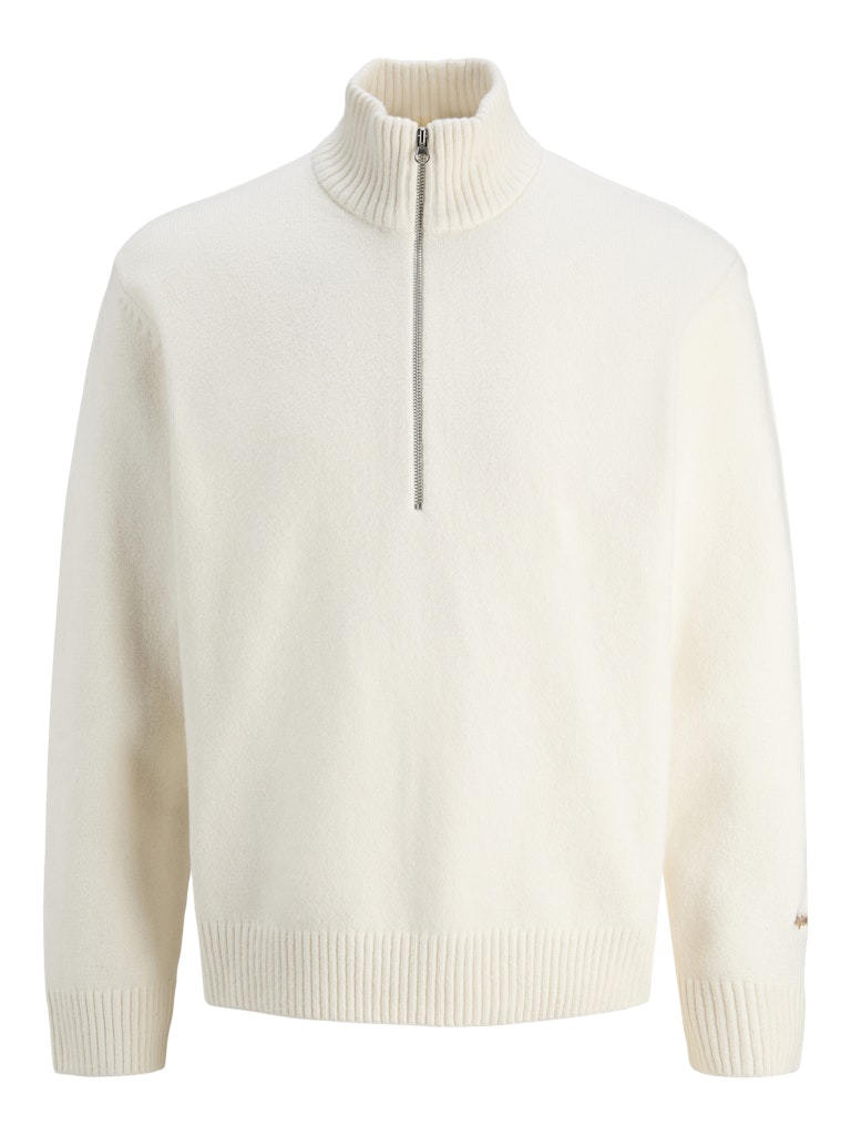 Cream half-zip sweater on a white background