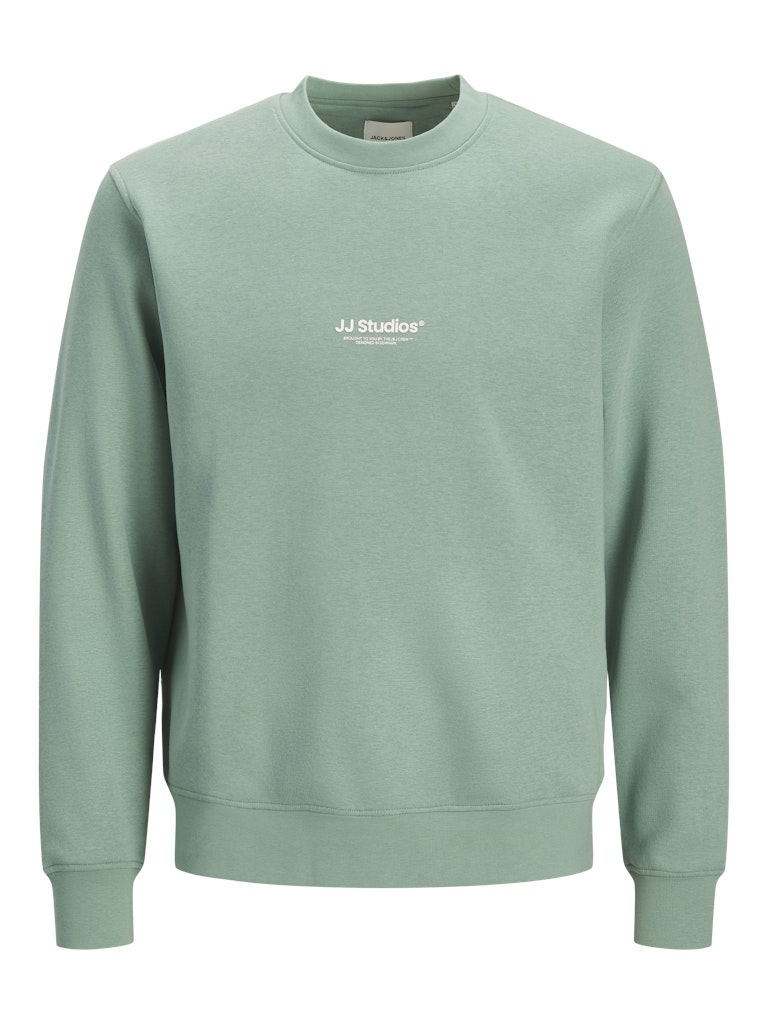 Green sweatshirt with 'JJ Studios' logo on a white background