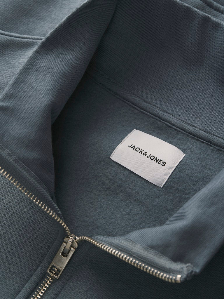 Close-up of a gray sweatshirt with a Jack & Jones label.