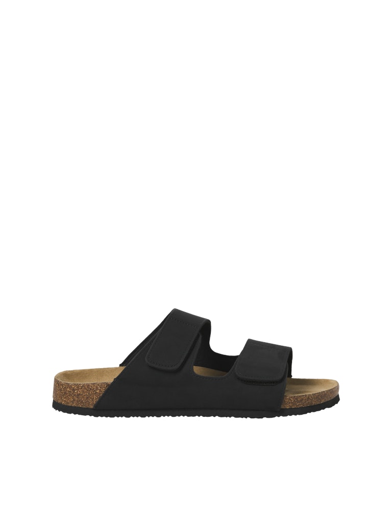 Black sandal with cork sole on a white background