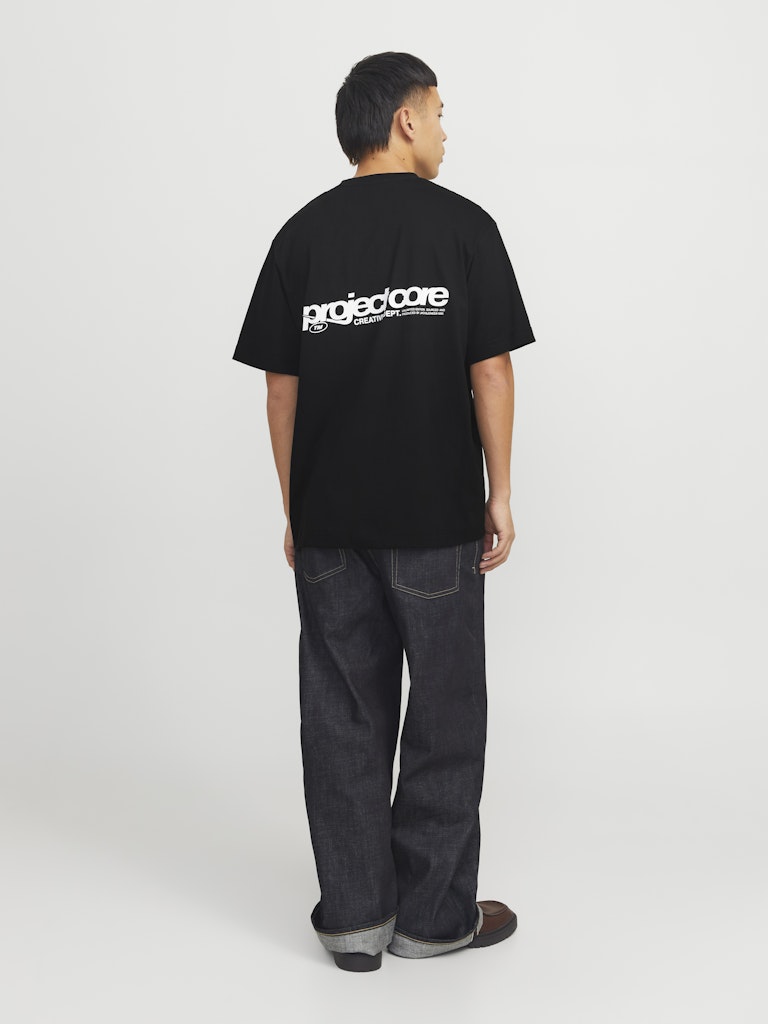 Person wearing a black t-shirt with 'projectcare' logo on the back, standing against a white background