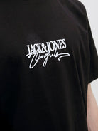 Almeria Branding Black Tee-Chest logo view