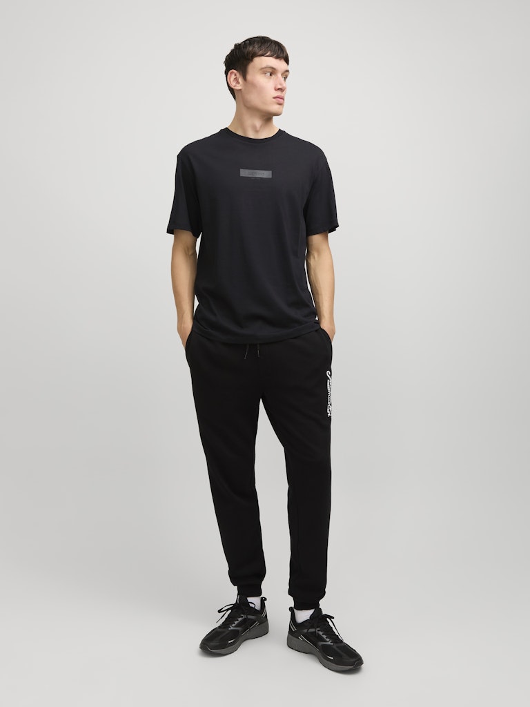 Taka Crew Neck Black Tee-Full model view