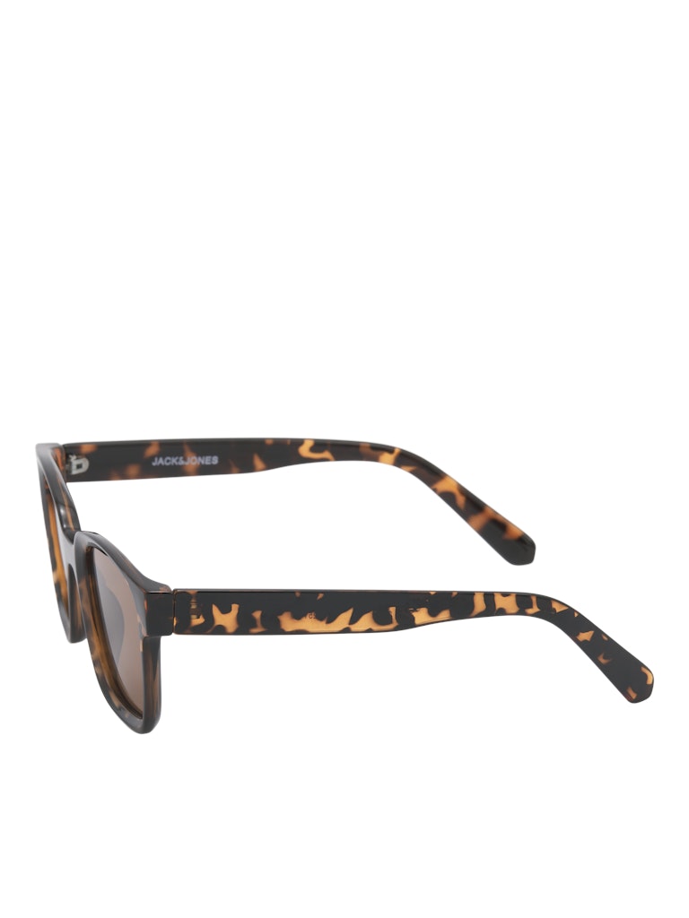 Sunglasses with tortoiseshell frame on a white background