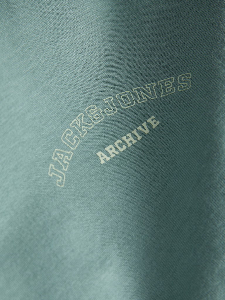 Teal fabric with 'Jack & Jones Archive' print