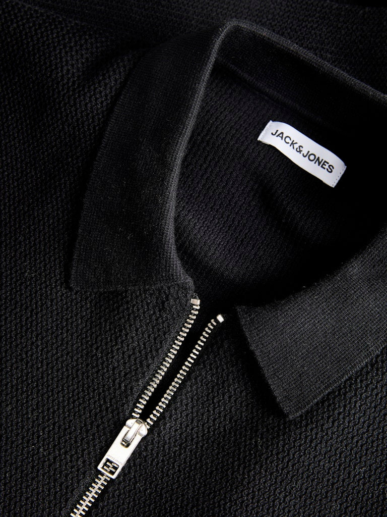 Black polo shirt with a zipper and 'Jack & Jones' label
