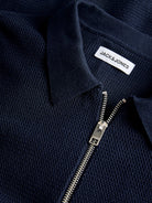 Navy blue zip-up polo shirt with 'Jack & Jones' label