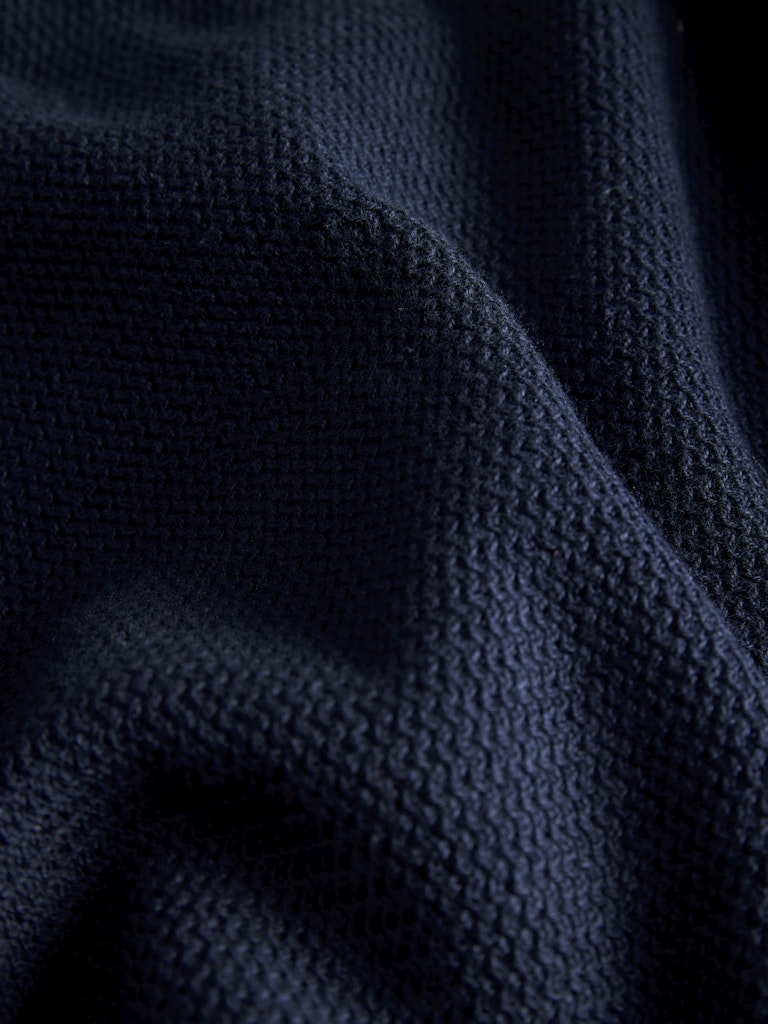 Close-up of dark blue textured fabric
