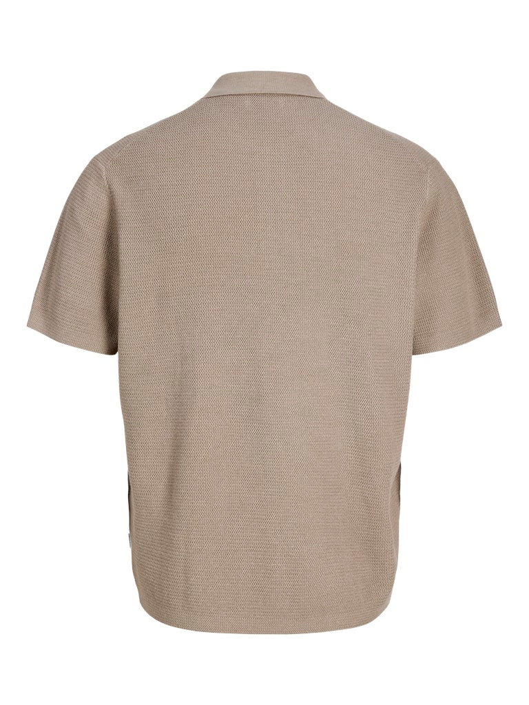 Beige polo shirt on a white background