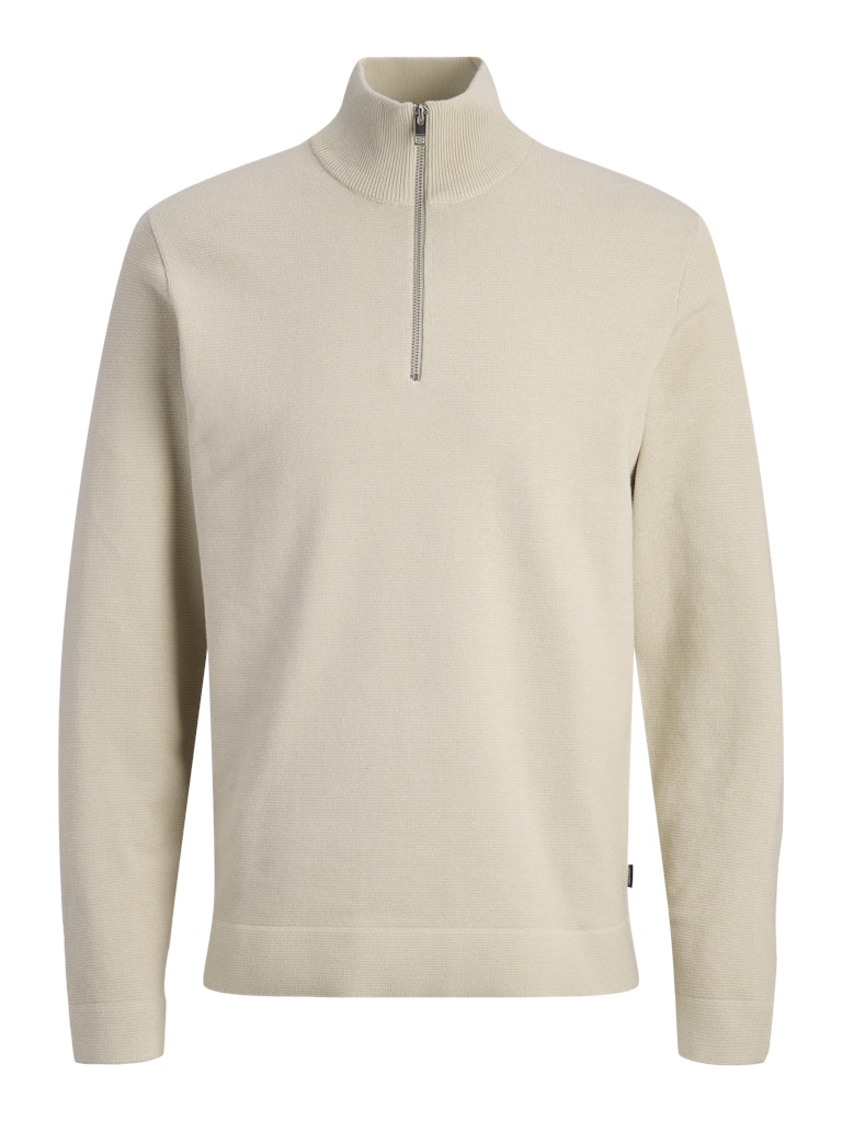 Beige half-zip sweater on a white background