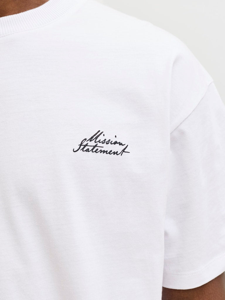 White t-shirt with 'Mission Statement' text on a plain background