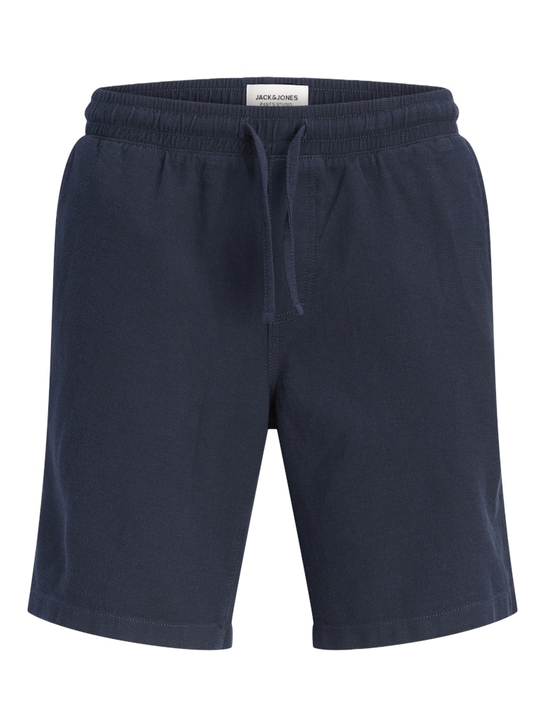 Navy blue shorts with drawstring on a white background