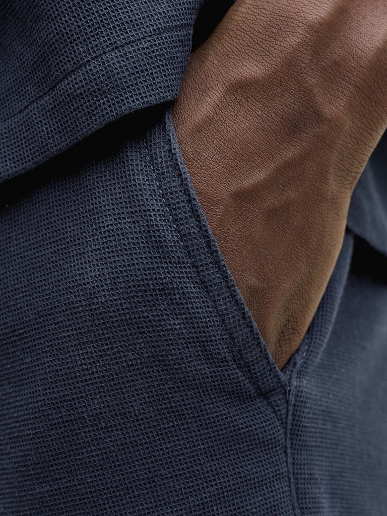 Close-up of navy short pocket 