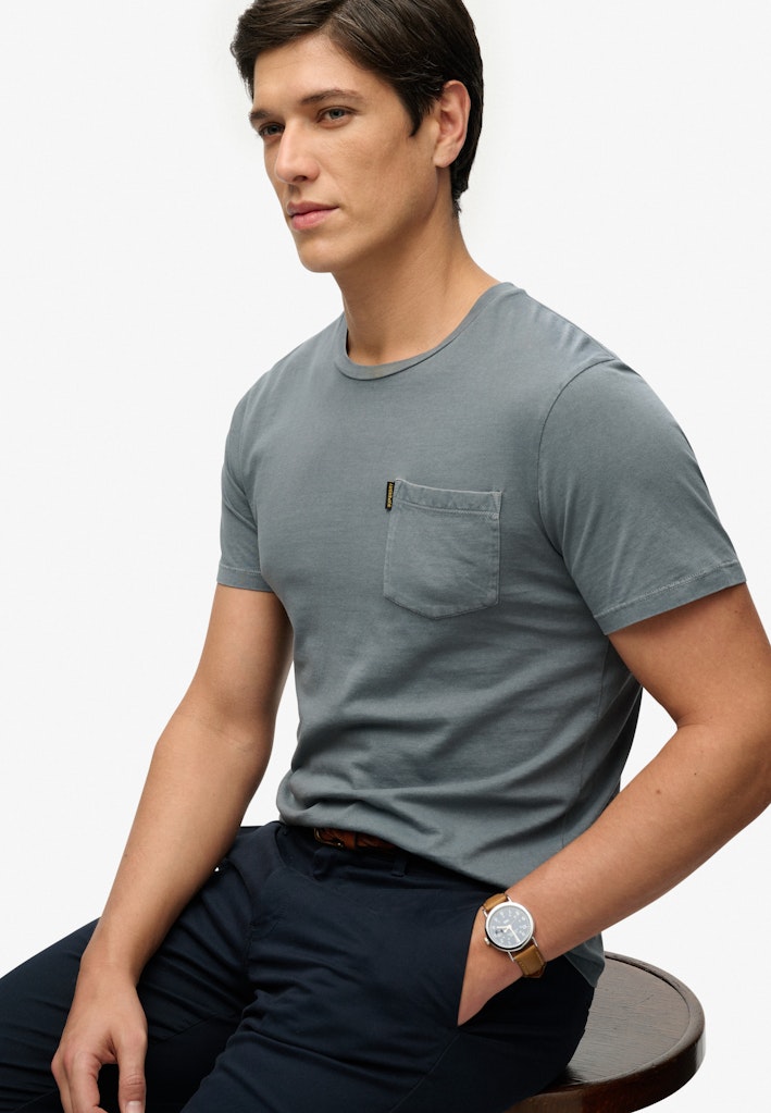 Model wearing  the Classic Essential Pocket Blue Mirage T-Shirt