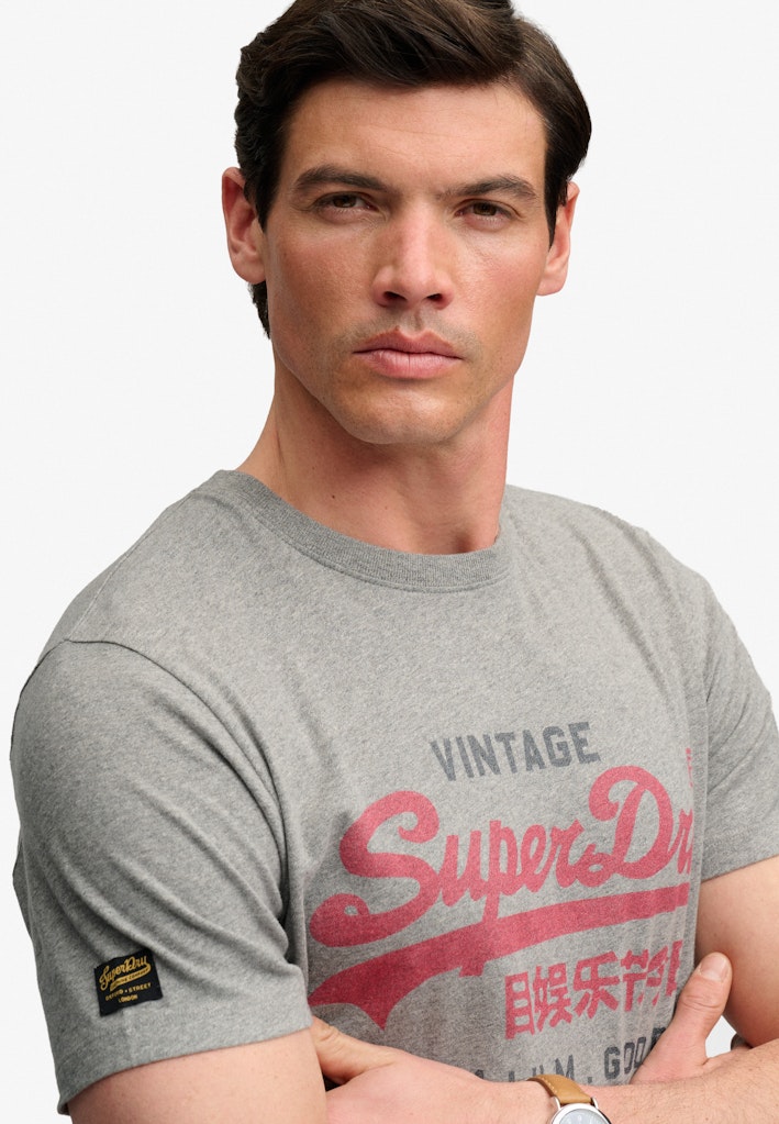 Superdry Vintage Logo Heritage Relaxed Tee in Dark Vintage Grey Marl angled model view