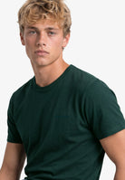 Superdry Essential Company Logo Tee in Forest Green/Deep Green angled model view