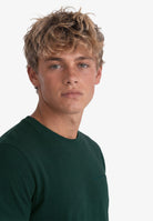 Superdry Essential Company Logo Tee in Forest Green/Deep Green half model view