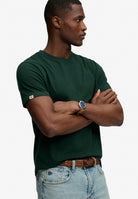 Superdry Essential Company Logo Tee in Forest Green/Deep Green angled model view angled model view