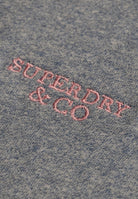 Superdry Essential Stacked Logo Embroidered Tee in Bay Blue Marl/Pink embroidered logo detail