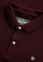 Superdry Vintage Destroy Polo in Winter Port collar and button placket detail