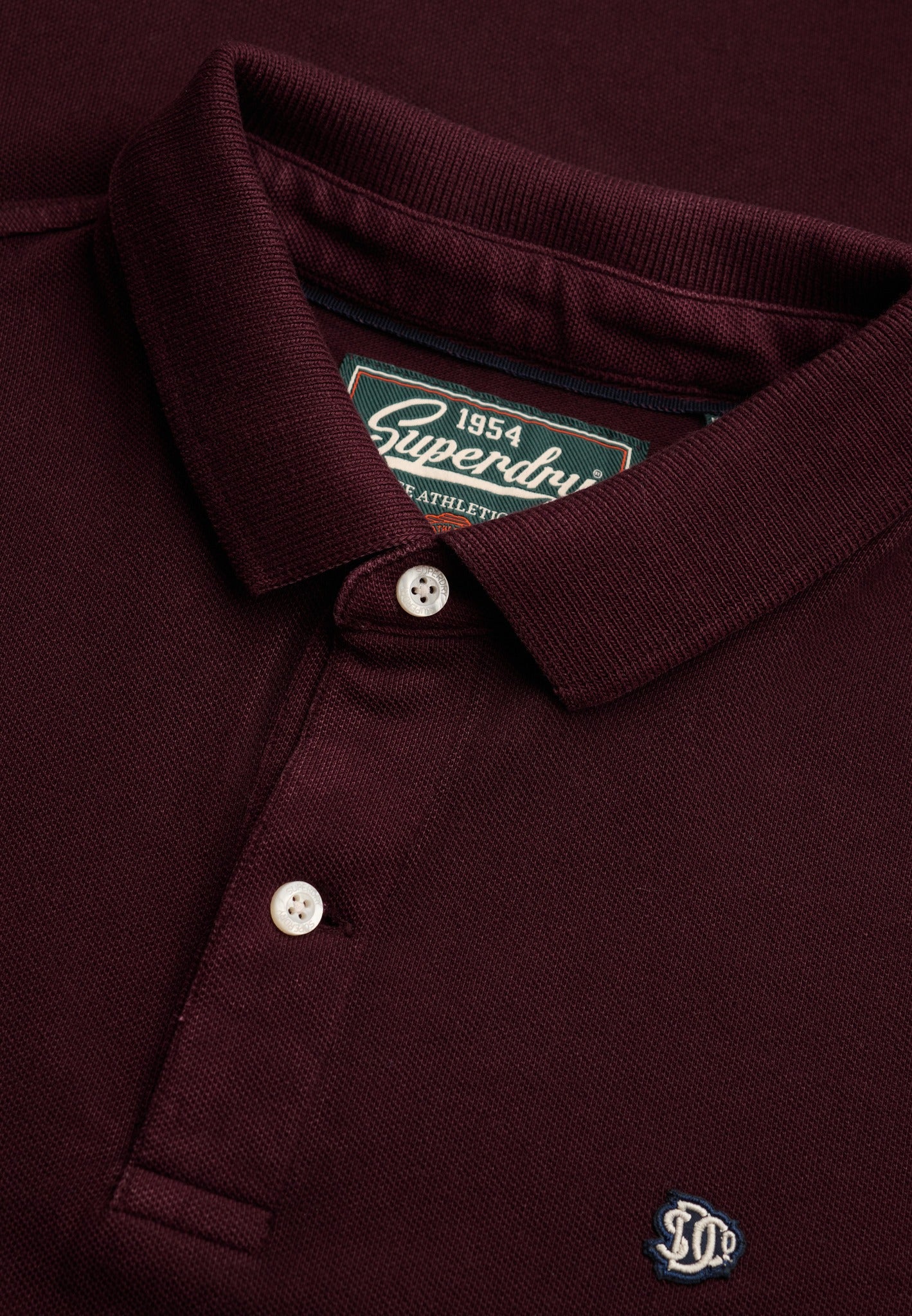 Superdry Vintage Destroy Polo in Winter Port collar and button placket detail