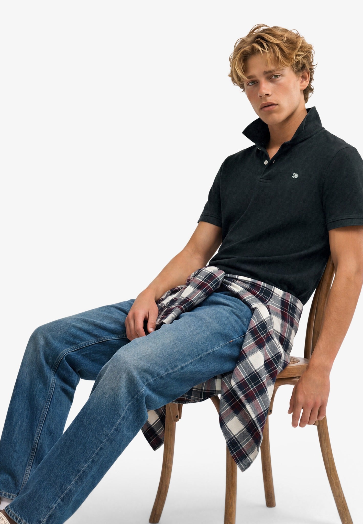 Superdry Vintage Destroy Polo in Eclipse Navy seated model view