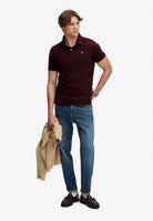Superdry Vintage Destroy Polo in Winter Port full length model view