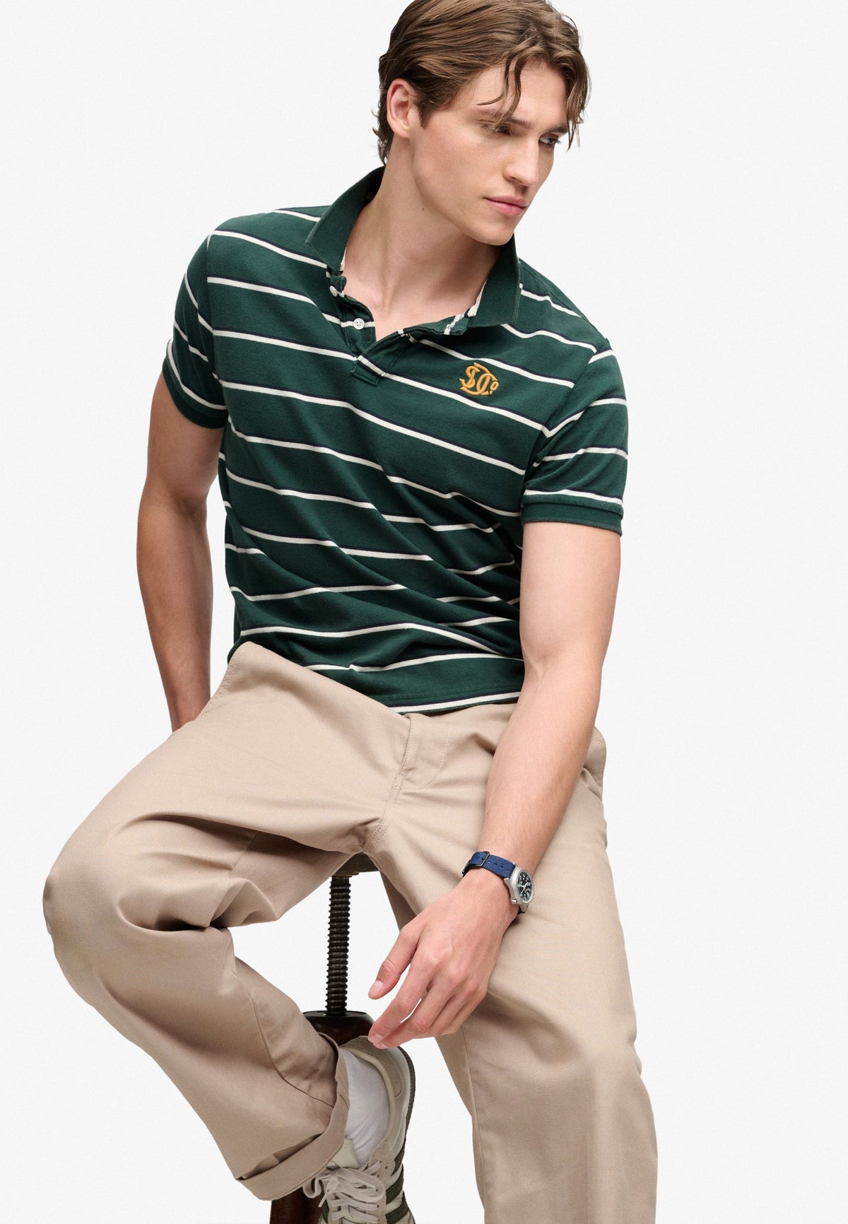 Superdry Vintage Stripe Jersey Polo in Green/Navy Stripe seated view