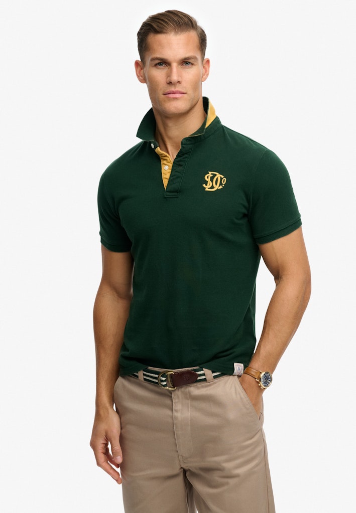 SUPERDRY Pique Monogram Polo Enamel Green Winter Gold front view model wearing