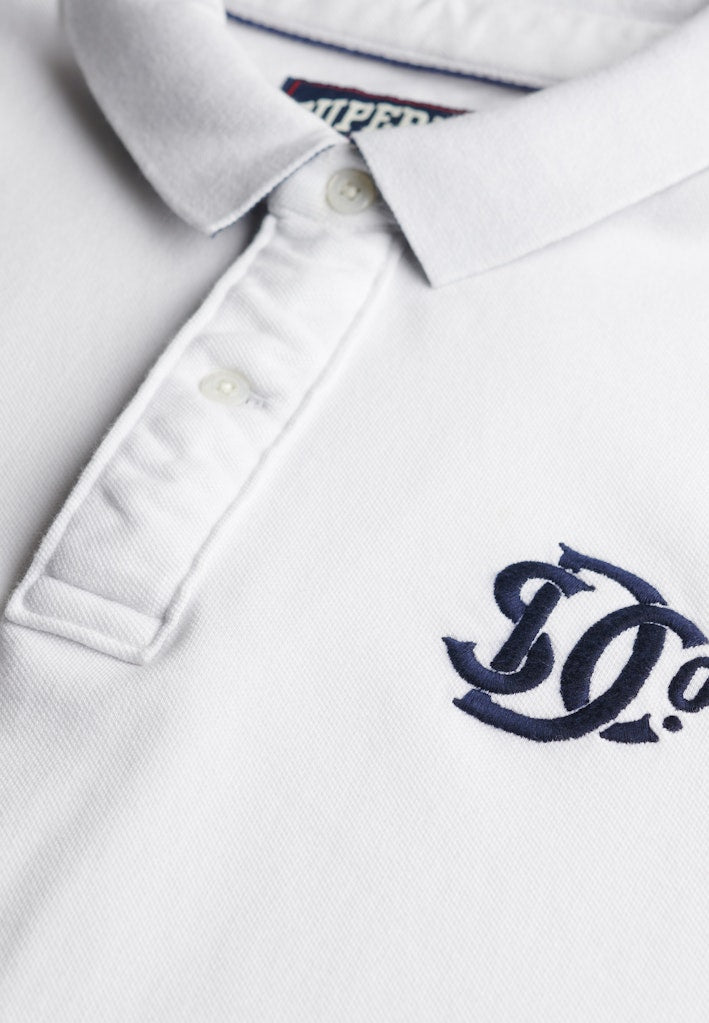 SUPERDRY Pique monogram navy polo shirt in optic/darkest navy, logo detail