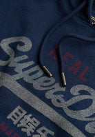 Superdry Vintage Logo Heritage Relaxed Hood in Deep Sea Blue Marl logo print detail