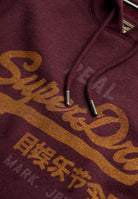 Superdry Vintage Logo Heritage Relaxed Hood in Tawny Port Marl logo print detail