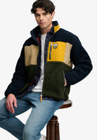 Superdry Colour Block Retro Zip Fleece in Eclipse Navy Mix seated model view