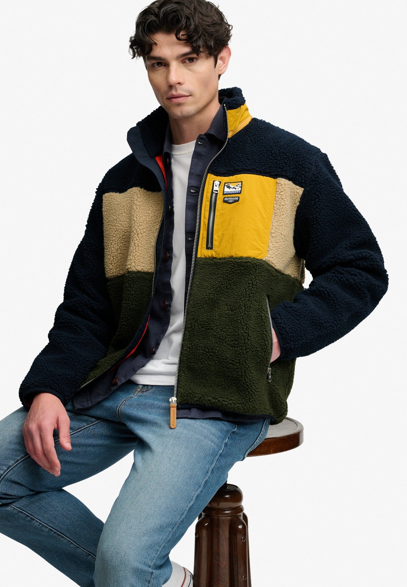 Superdry Colour Block Retro Zip Fleece in Eclipse Navy Mix seated model view