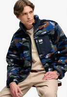Superdry Terrain Fleece Zip Thru in Navy Terrain seated view