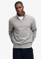 Superdry Essential Serif Logo Half Zip in Dark Vintage Grey Marl on model