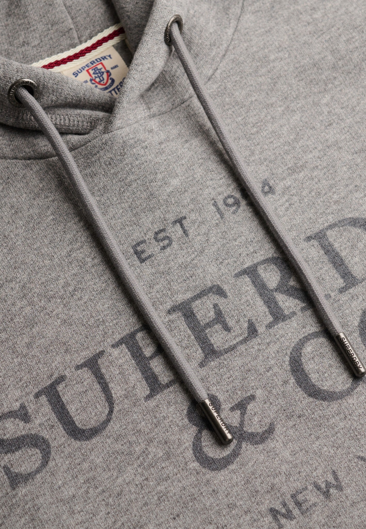 Superdry 1954 Company Relaxed Hood in Dark Vintage Grey Marl hood and print detail
